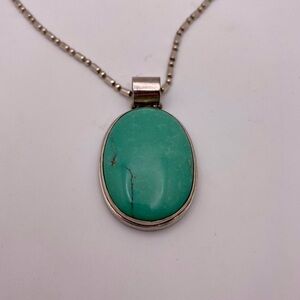 EXEX Claudia Agudelo turquoise 975 silver pendant and chain.